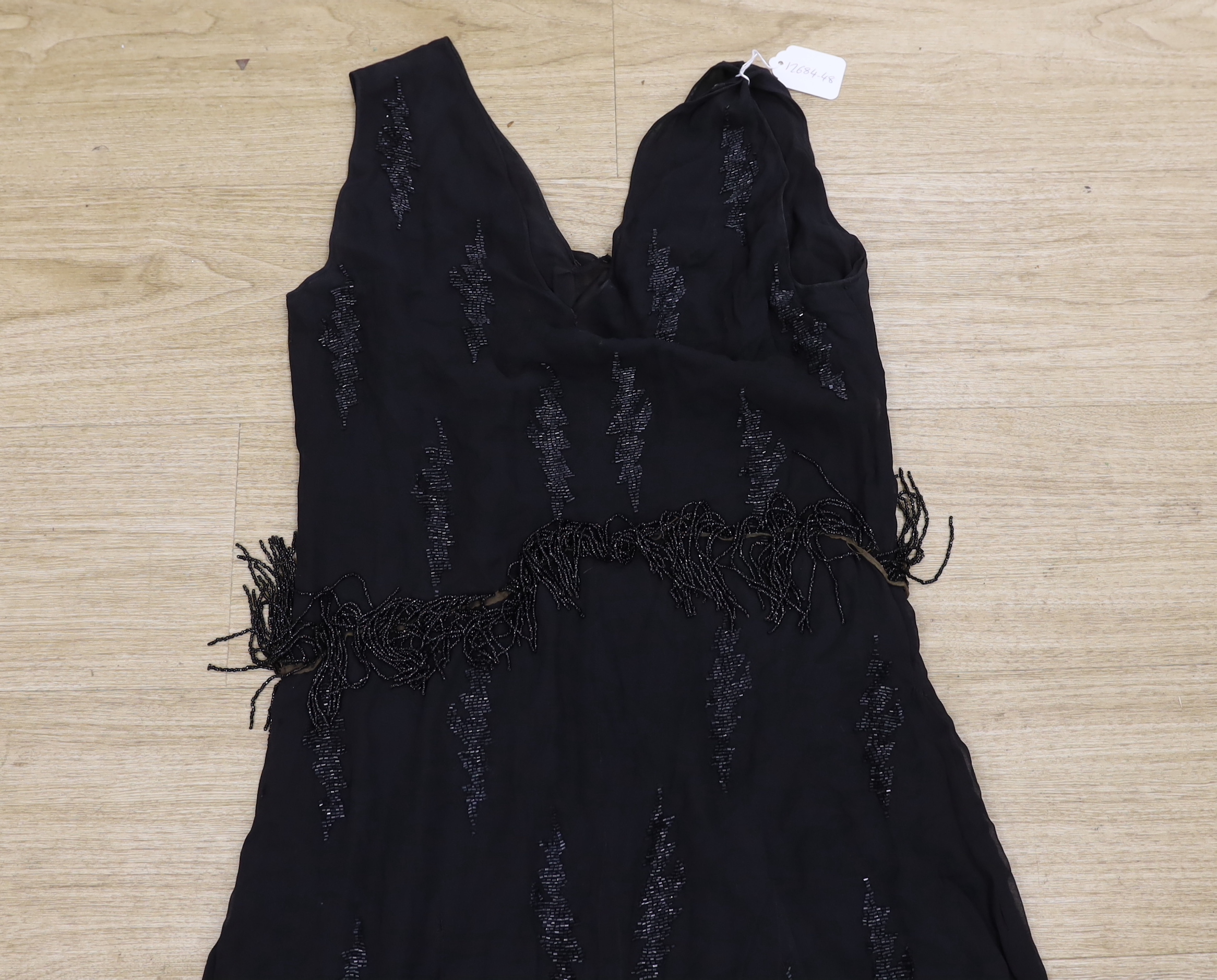 A 1930's black beaded evening dress